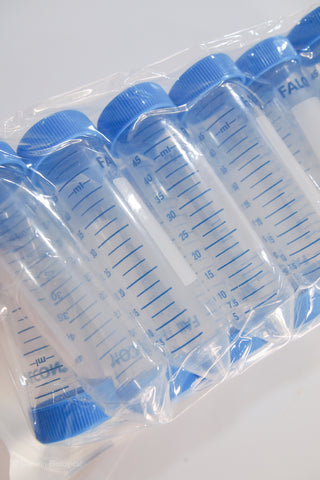 A pack of clear plastic conical tubes with blue caps and blue printed measurement markings, sealed in a transparent plastic bag.