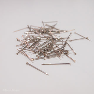 Setting pins in pile